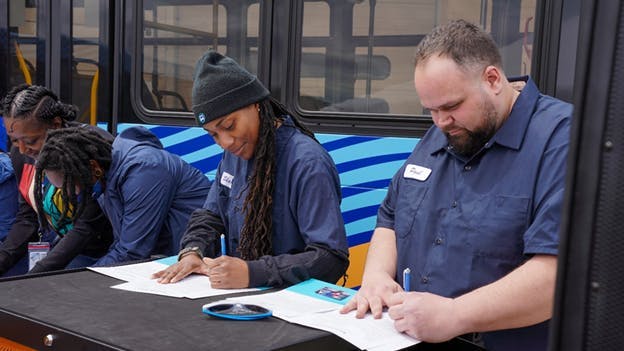 The apprenticeship event featured remarks from state and county leaders, a ceremonial apprenticeship signing, and a presentation of toolboxes and gear to the inaugural class of apprentices, The apprenticeship event featured remarks from state and county leaders, a ceremonial apprenticeship signing, and a presentation of toolboxes and gear to the inaugural class of apprentices,