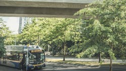 TransLink bus pulls up to bus stop TransLink bus pulls up to bus stop
