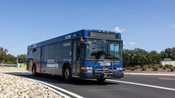 CDTA bus rolls down empty street CDTA bus rolls down empty street