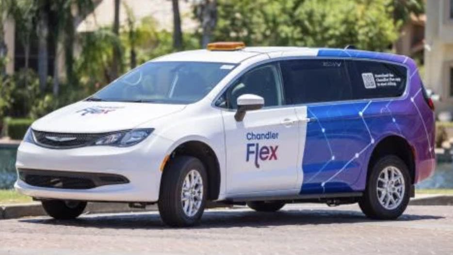 chandler flex-branded mini van parks next to a street curb