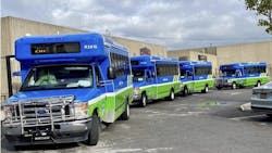 cutaway buses in RTS colors of blue and green line up at Batavia City Center hub cutaway buses in RTS colors of blue and green line up at Batavia City Center hub