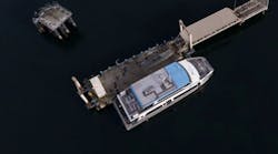 a birds eye view of the Vashon Island water taxi at a dock a birds eye view of the Vashon Island water taxi at a dock