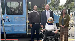 Gresham Mayor Travis Stovall; TriMet Executive Director of Public Affairs, JC Vannatta; TriMet Committee on Accessible Transportation (CAT) Chair, Jan Campbell; and Chief People and Strategy Officer for Meals on Wheels People, Jessica Morris, with a TriMet NEXT bus at the Multnomah County East Building in Gresham.