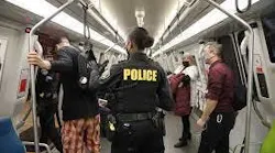 BART police officer on a BART train.