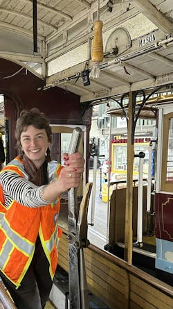 Leslie Bienenfeld on an SFMTA cable car. Leslie Bienenfeld on an SFMTA cable car.