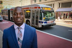 Philip Asabere next to a SEPTA bus. Philip Asabere next to a SEPTA bus.