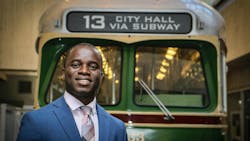 Philip Asabere in front of a SEPTA train. Philip Asabere in front of a SEPTA train.