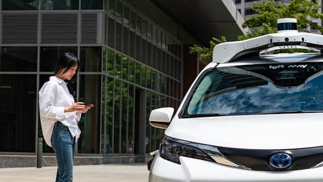 May Mobility rider prepares to take an autonomous ride.