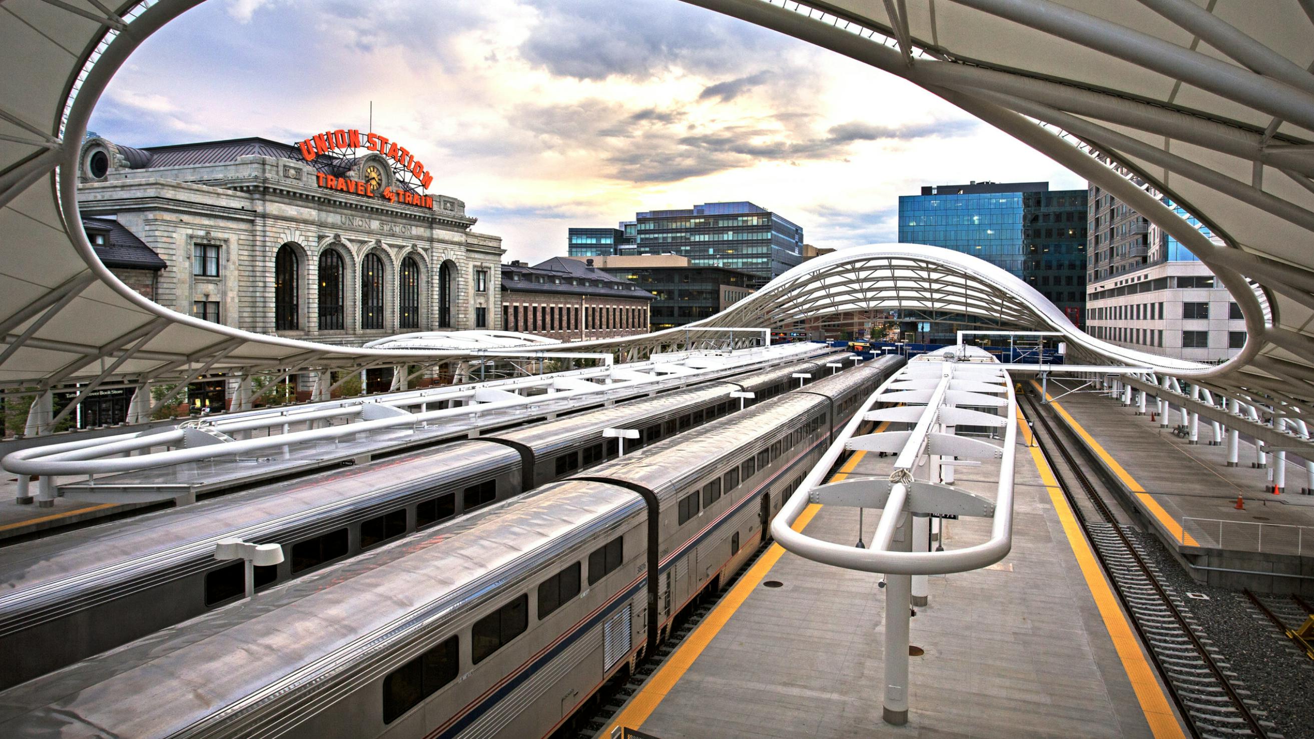 amtrak trains sit outside Denver Union Station
