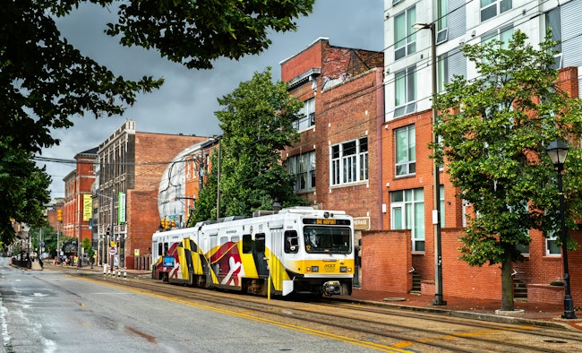 MDOT MTA light rail runs down empty street