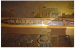 Rail spalling resulting from severe corrugation. Rail spalling resulting from severe corrugation.