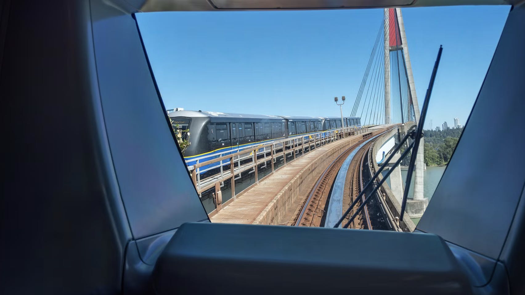 looking out the window of the front car on a Mark V train