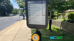 A new ePaper display mounted at a bus stop.