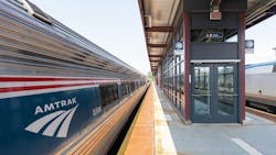 An Amtrak train sits at an elevated platform in Springfield, Mass. An Amtrak train sits at an elevated platform in Springfield, Mass.