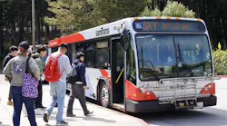 Students getting on a SamTrans bus.