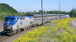 The Heartland Flyer train travels down the track.