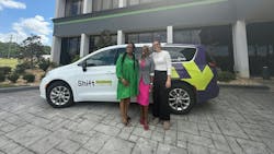 Launching members stand in front of a Shift On Demand shuttle van. Launching members stand in front of a Shift On Demand shuttle van.