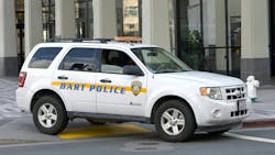 A Ford Escape wearing the BART PD livery sits in front of of a Berkeley station. A Ford Escape wearing the BART PD livery sits in front of of a Berkeley station.