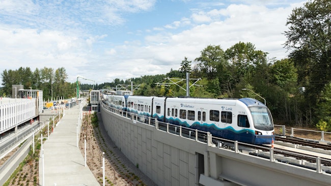 A Sound Transit train crossing Star Lake Station.