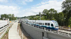 A Sound Transit train crossing Star Lake Station.