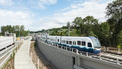 A Sound Transit train crossing Star Lake Station. A Sound Transit train crossing Star Lake Station.