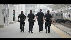 A back view of Denver Regional Transportation District police officers. A back view of Denver Regional Transportation District police officers.