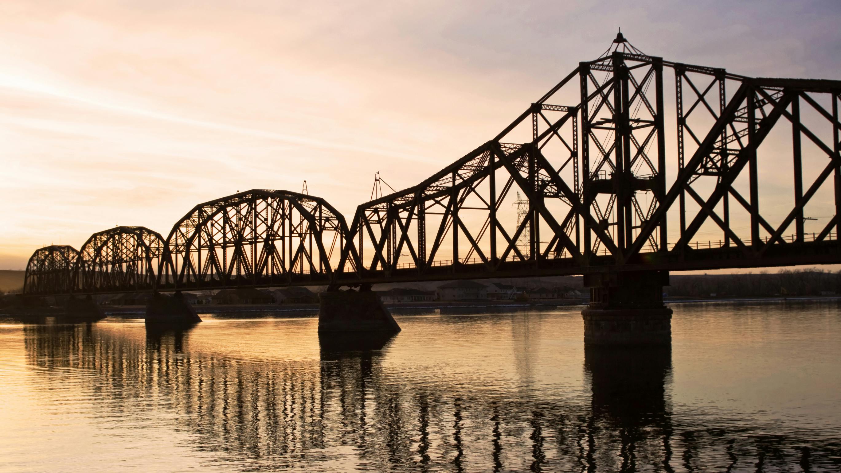 A railroad bridge over the Missouri River. The Chicago and North Eastern Railroad Bridge in Pierre, South Dakota.