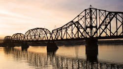 A railroad bridge over the Missouri River. The Chicago and North Eastern Railroad Bridge in Pierre, South Dakota. A railroad bridge over the Missouri River. The Chicago and North Eastern Railroad Bridge in Pierre, South Dakota.