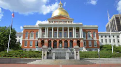 The image displays the Massachusetts state house.