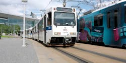 A Denver Regional Transportation District train on railraod tracks. A Denver Regional Transportation District train on railraod tracks.