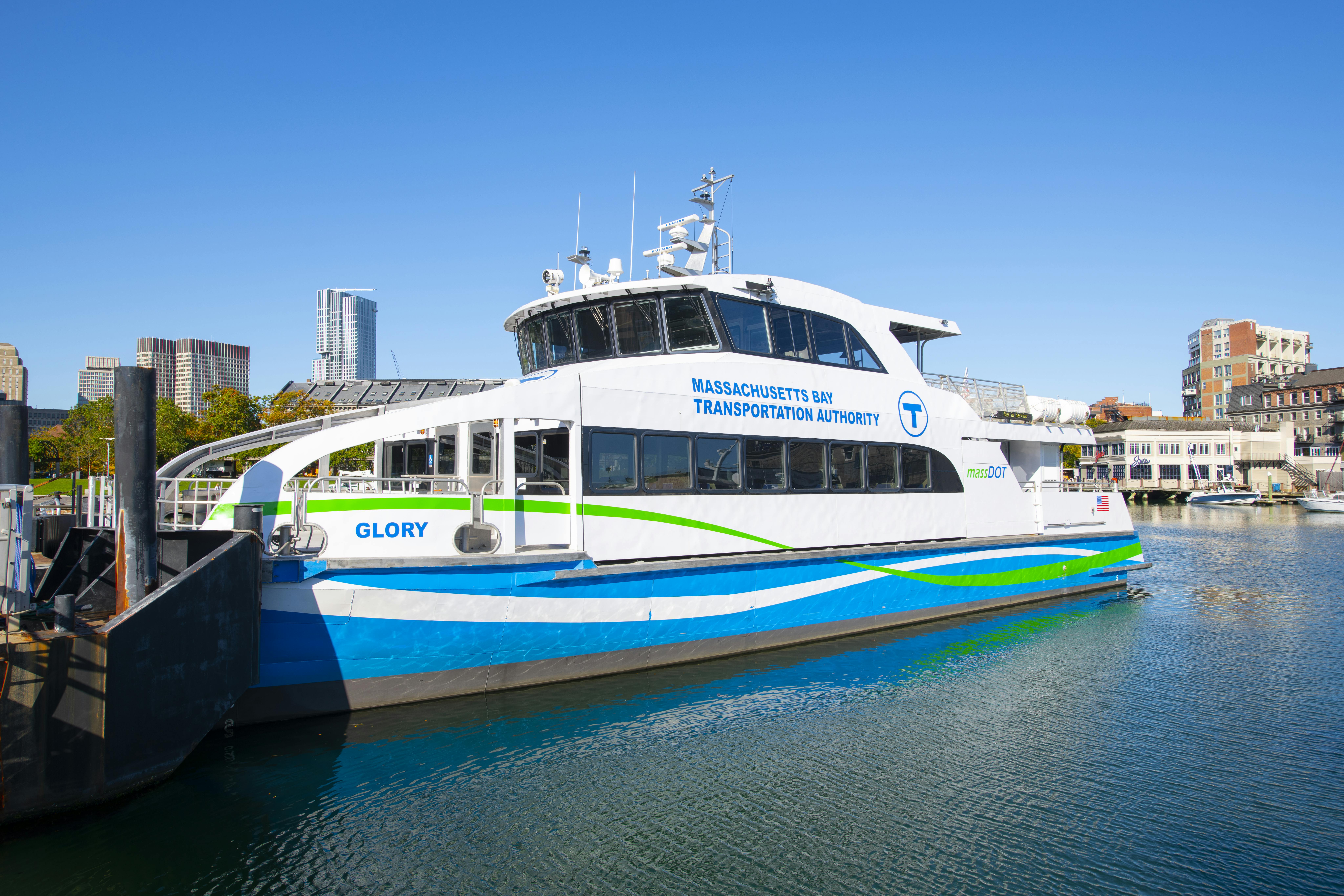 The image shows an MBTA ferry on the water.