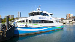 The image shows an MBTA ferry on the water.