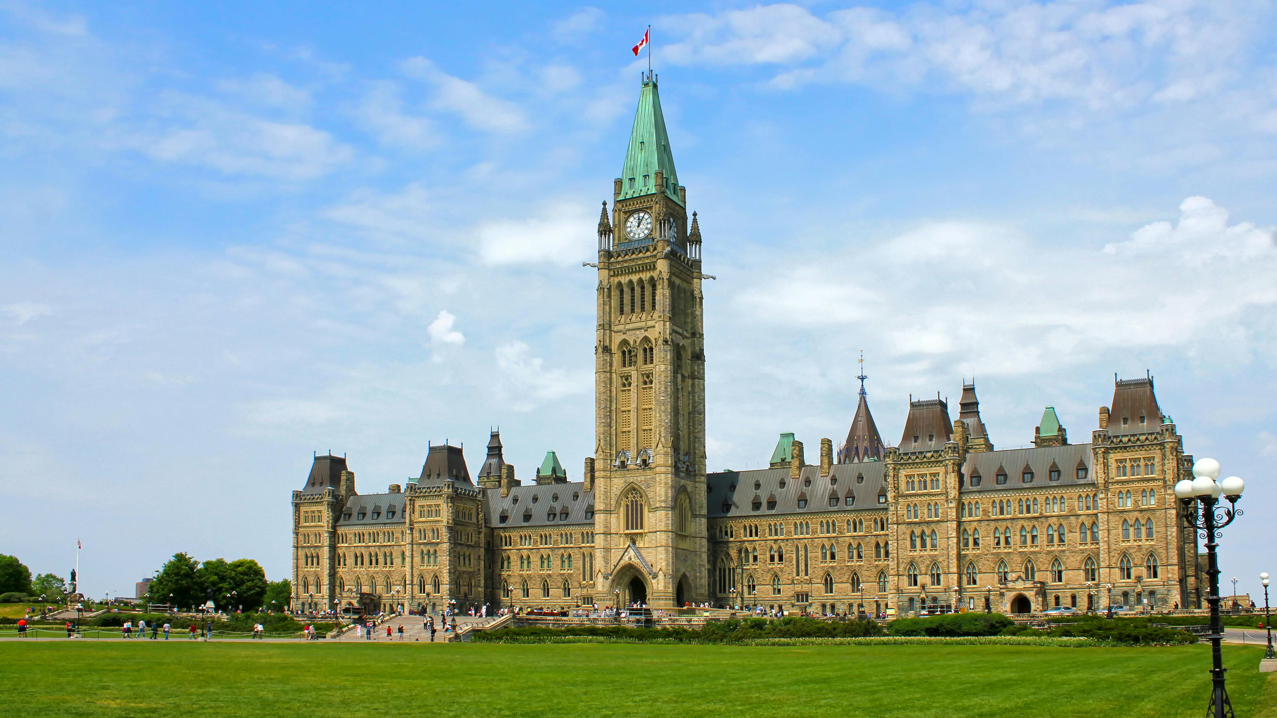 The image displays Canada's Parliament Hill.
