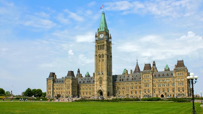 The image displays Canada's Parliament Hill.