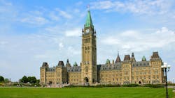The image displays Canada's Parliament Hill. The image displays Canada's Parliament Hill.