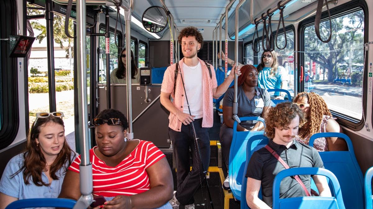 Riders sit on a PSTA bus.