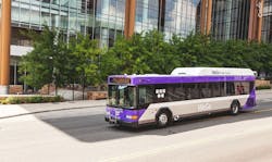 A WeGo bus traverses a city street. A WeGo bus traverses a city street.