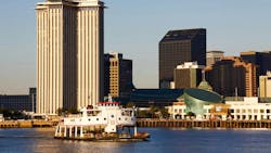 The Algiers Ferry traverses the Mississippi River. The Algiers Ferry traverses the Mississippi River.