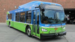 An RTS bus sits parked in a lot. An RTS bus sits parked in a lot.