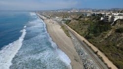 A drone shot of the coastal rail line. A drone shot of the coastal rail line.