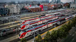 aerial view of multiple caltrain trainsets in the rail yard