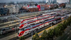 aerial view of multiple caltrain trainsets in the rail yard aerial view of multiple caltrain trainsets in the rail yard