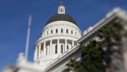 A framed shot of the California Capitol building. A framed shot of the California Capitol building.