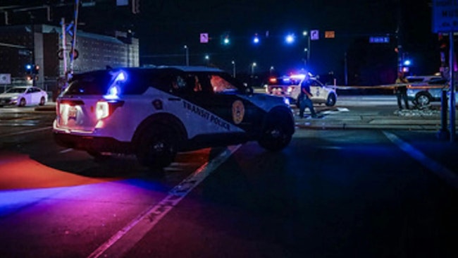 RTD-PD cruisers sit illuminated at night.