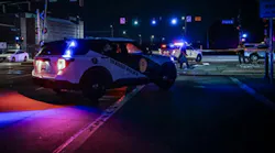 RTD-PD cruisers sit illuminated at night.