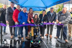 A group of MBTA leadership cuts a ribbon in front of the renovated station. A group of MBTA leadership cuts a ribbon in front of the renovated station.