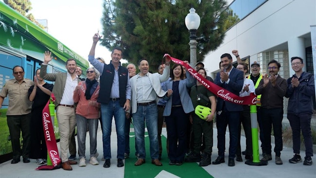 City leaders cut the ribbon on the Robertson Bus/Bike Lane Project.