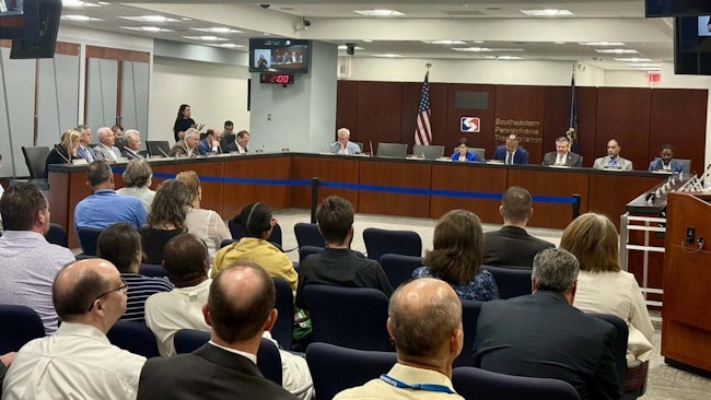 The SEPTA board sits before an audience.