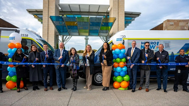 Cincinnati officals pose at a ribbon cutting.