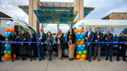 Cincinnati officals pose at a ribbon cutting.
